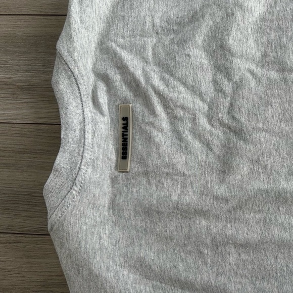 ESSENTIALS LONG SLEEVE GREY TSHIRT. NEVER WORN. SIZE XL - Picture 2 of 3